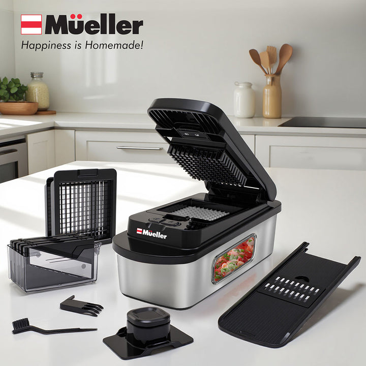 Mueller_8_Blade_Vegetable_Chopper_black stainless steel  kitchen appliance with various attachments on a kitchen counter, featuring the brand logo.