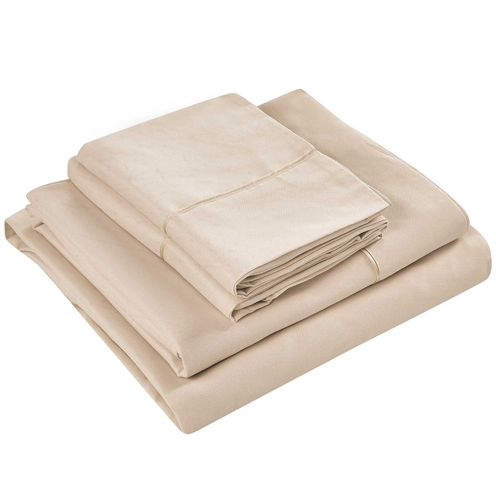 Beige bed sheets set on a white background