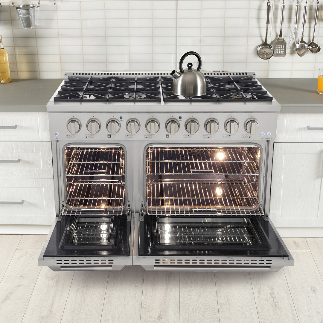 Mueller stainless steel double oven range with open doors in a kitchen setting. 
