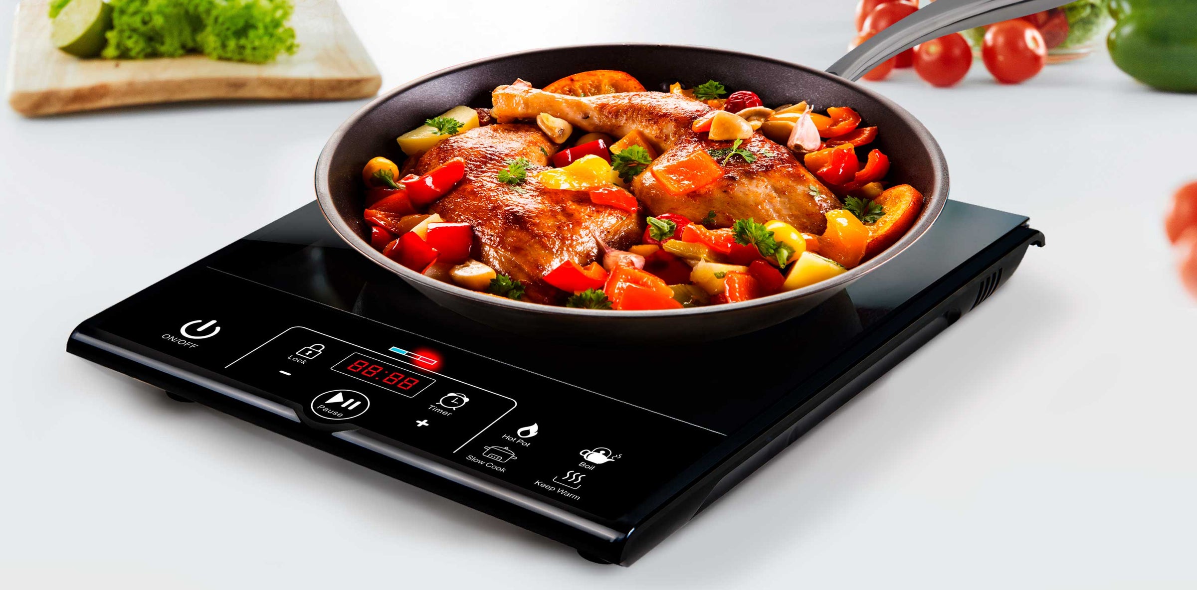 Mueller Induction cooktop with a pan with meat and veggies 