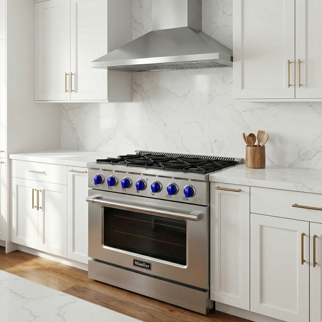 Mueller branded 36 inch stainless steel gas range, with blue knobs, in a white modern kitchen with white cabinets and tiles and stainless steel range hood.