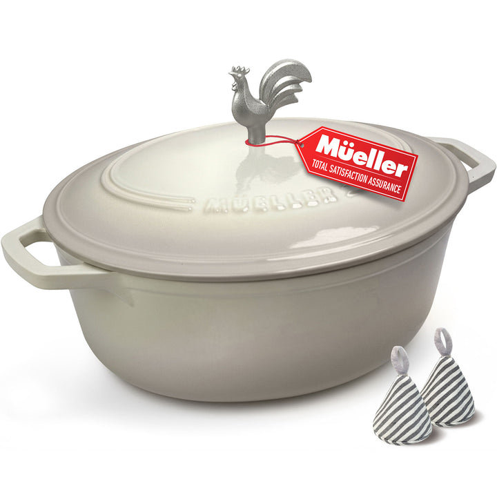 White Oval shaped Dutch oven with the Mueller brand embossed on the lid with a silver rooster knob, on a white background, with two pot holders in a grey striped pattern.