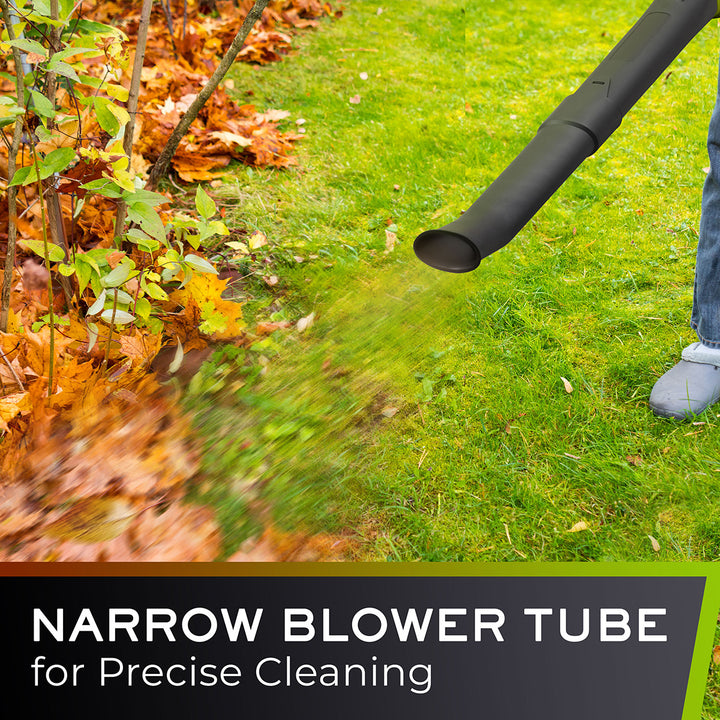 Person using a narrow blower tube to clean leaves on grass