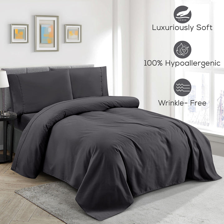 Dark gray bedding set on a bed in a bedroom with features highlighted.