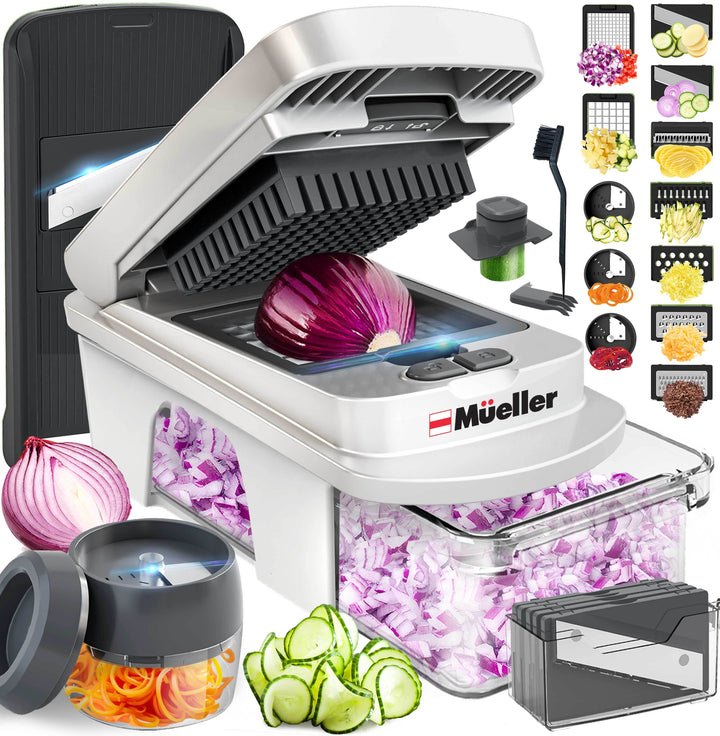Mueller_12_Blade_Vegetable_Chopper_white/gray with sliced vegetables and attachments on a white background