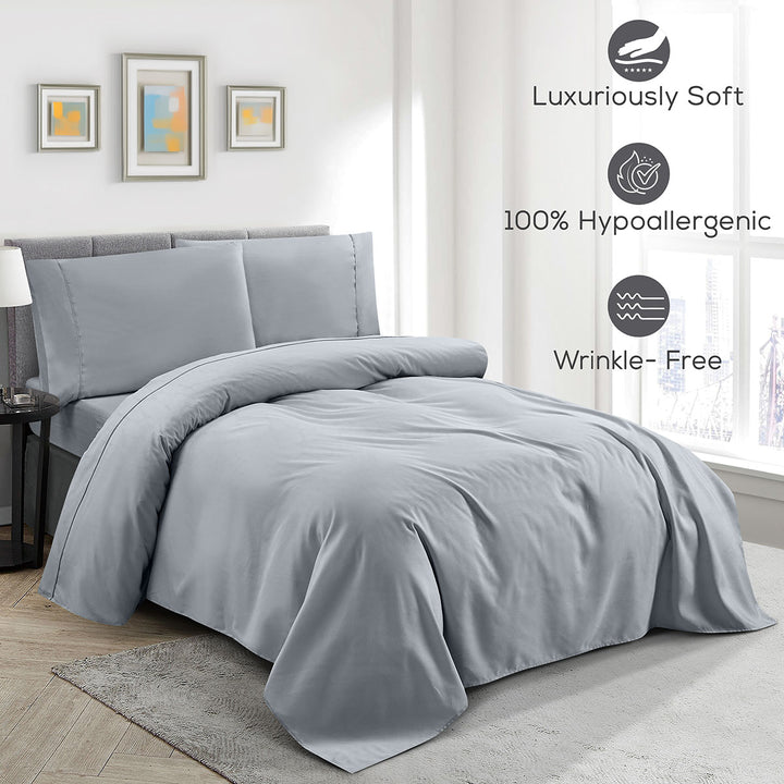 Gray bedding set on a bed in a bedroom with features highlighted.