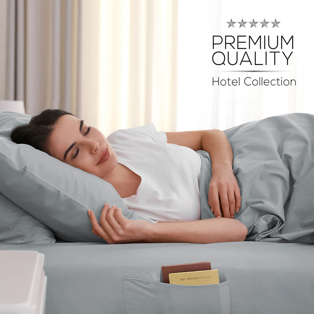 Woman lying on a bed with gray bedding, surrounded by five-star rating text.