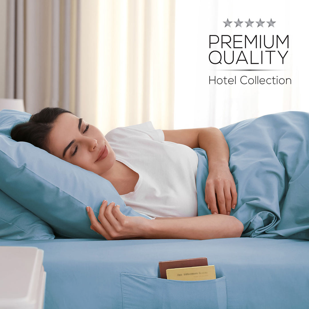 Woman lying on a bed with blue bedding, surrounded by 'Premium Quality Hotel Collection' text.