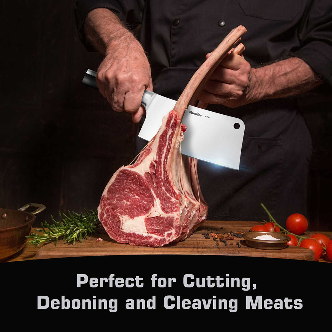 Person cutting a large piece of meat with a Mueller Cleaver Knife stainless steel on a wooden cutting board.