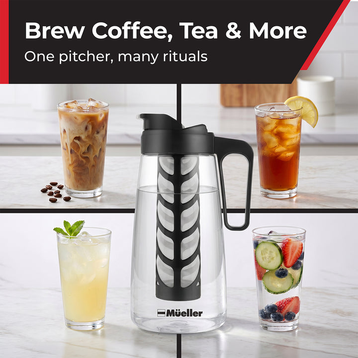 A clear glass Mueller coffee infuser pitcher with a black handle and lid, shown in a kitchen setting with four beverage glasses around it.