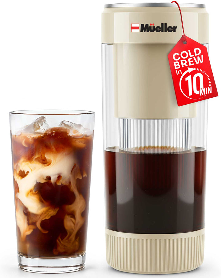 Beige Cold brew coffee maker with a glass of iced coffee on a white background