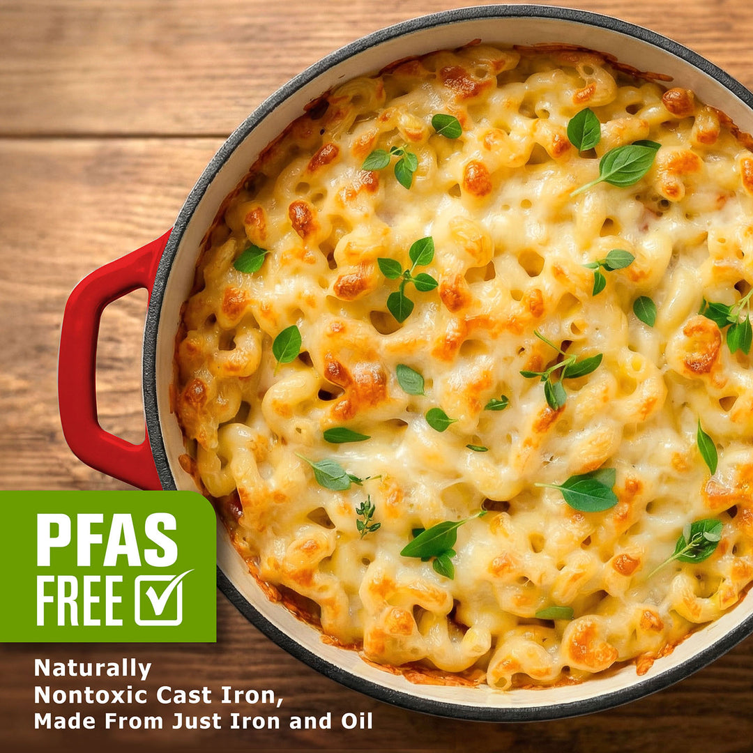 Macaroni and cheese in a Mueller Dutch Oven Red cast iron skillet on a wooden surface, with PFAS-free label.