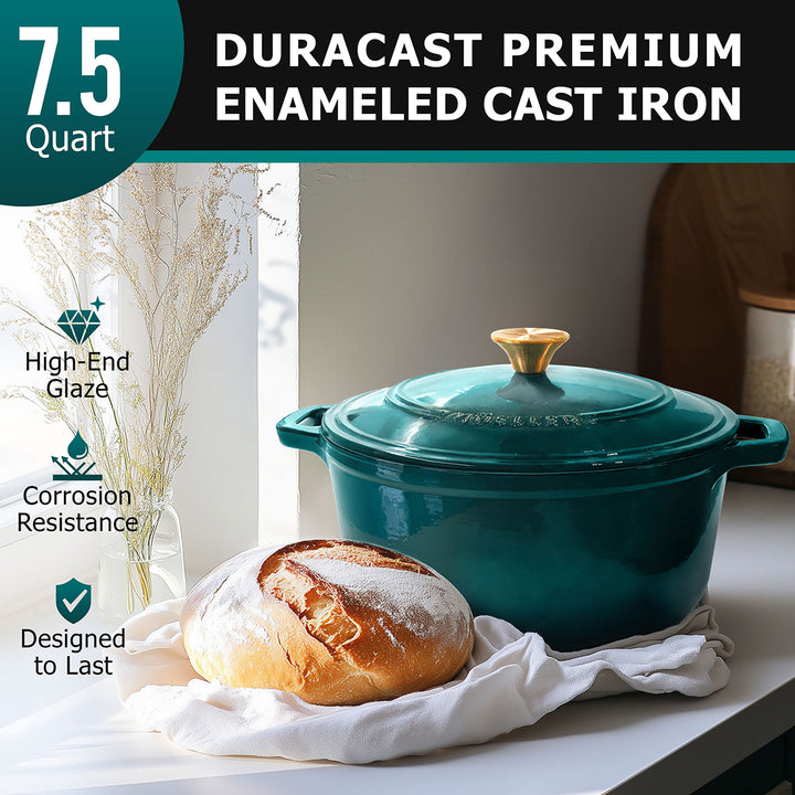 Mueller Dutch Oven emerald green enameled cast iron pot with a loaf of bread on a white surface, featuring Duracast branding.