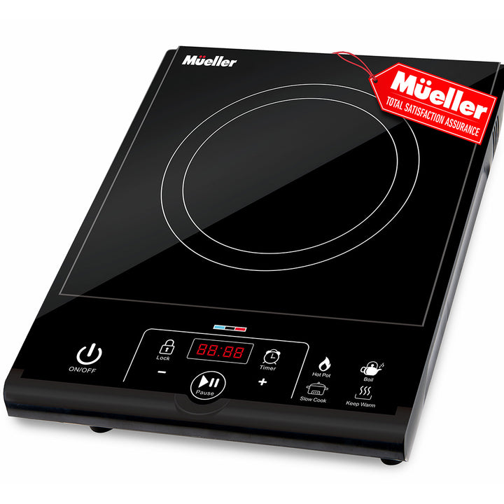 Black Mueller induction cooktop with digital display on a white background
