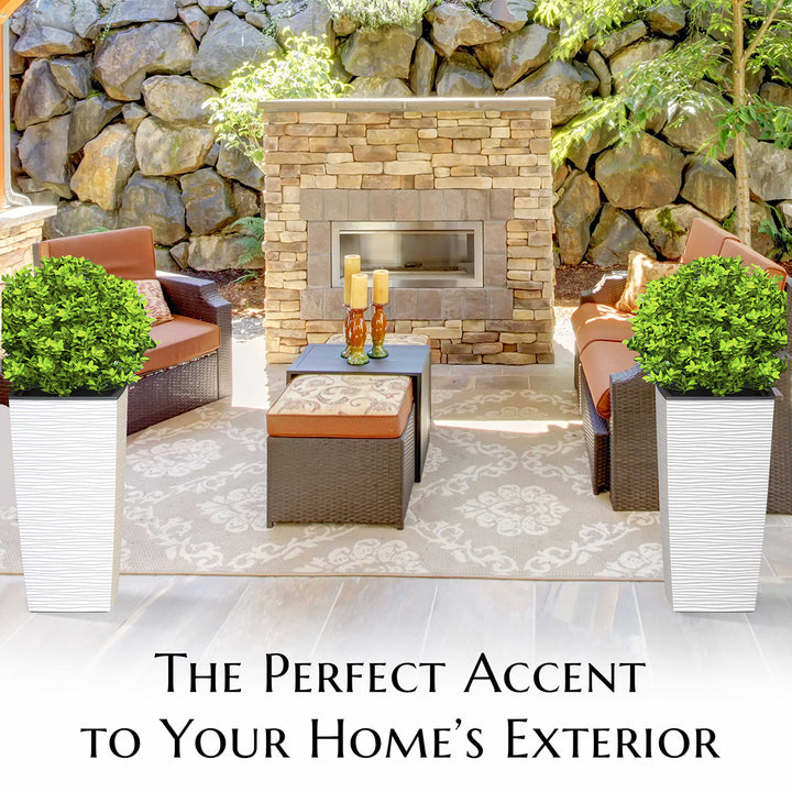 Outdoor patio with stone fireplace, chairs, and potted plants with text 'The Perfect Accent to Your Home's Exterior'.