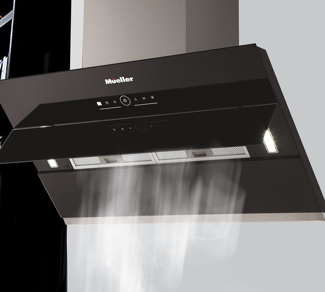 Black Mueller range hood with smoke effect on a gray background