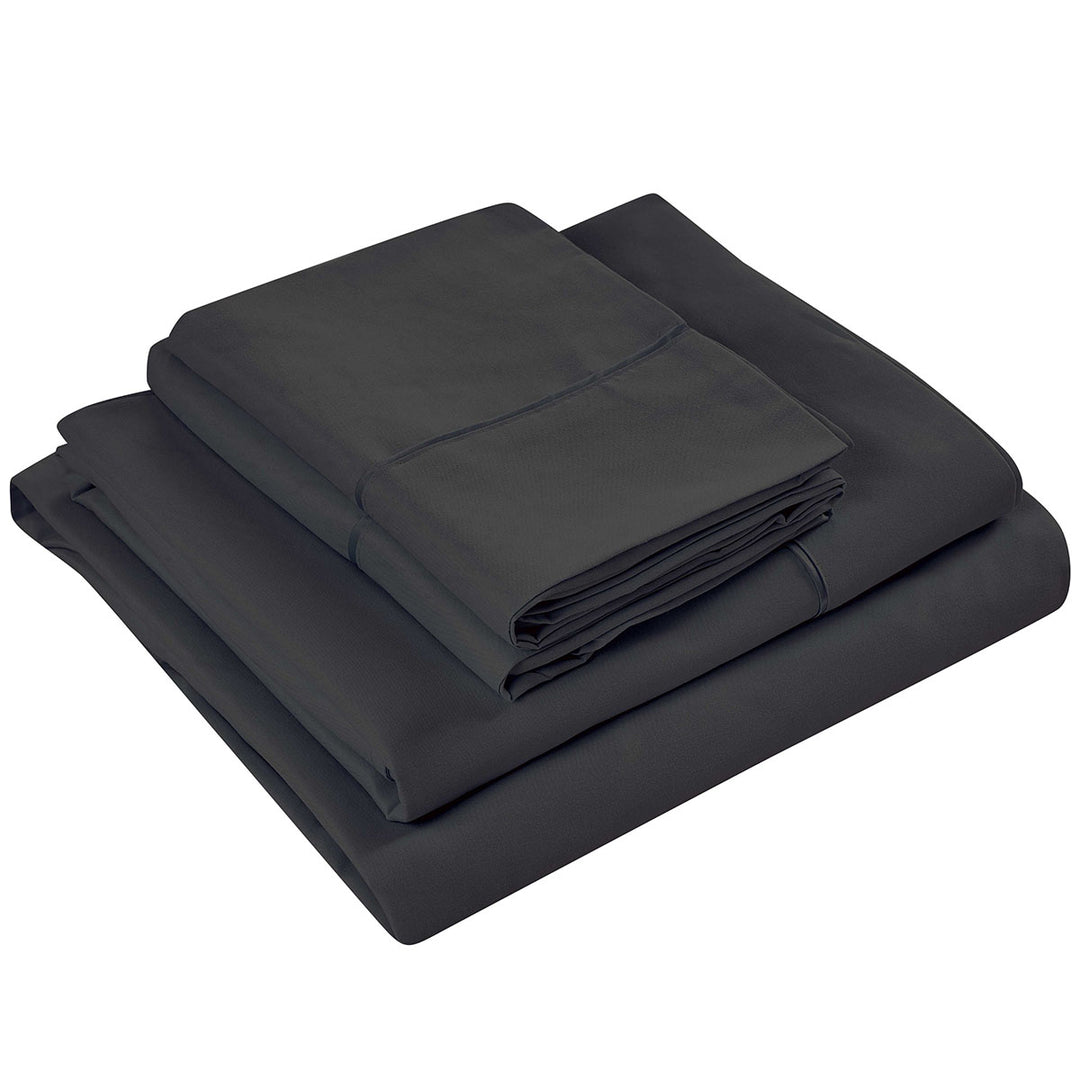 Set of black folded bed sheets on a white background
